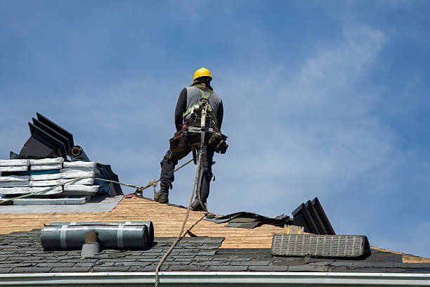 Professional Roofing technician working in Port Crane, NY